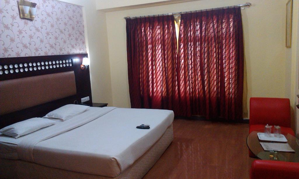 Solitaire Suites Bangalore Værelse billede